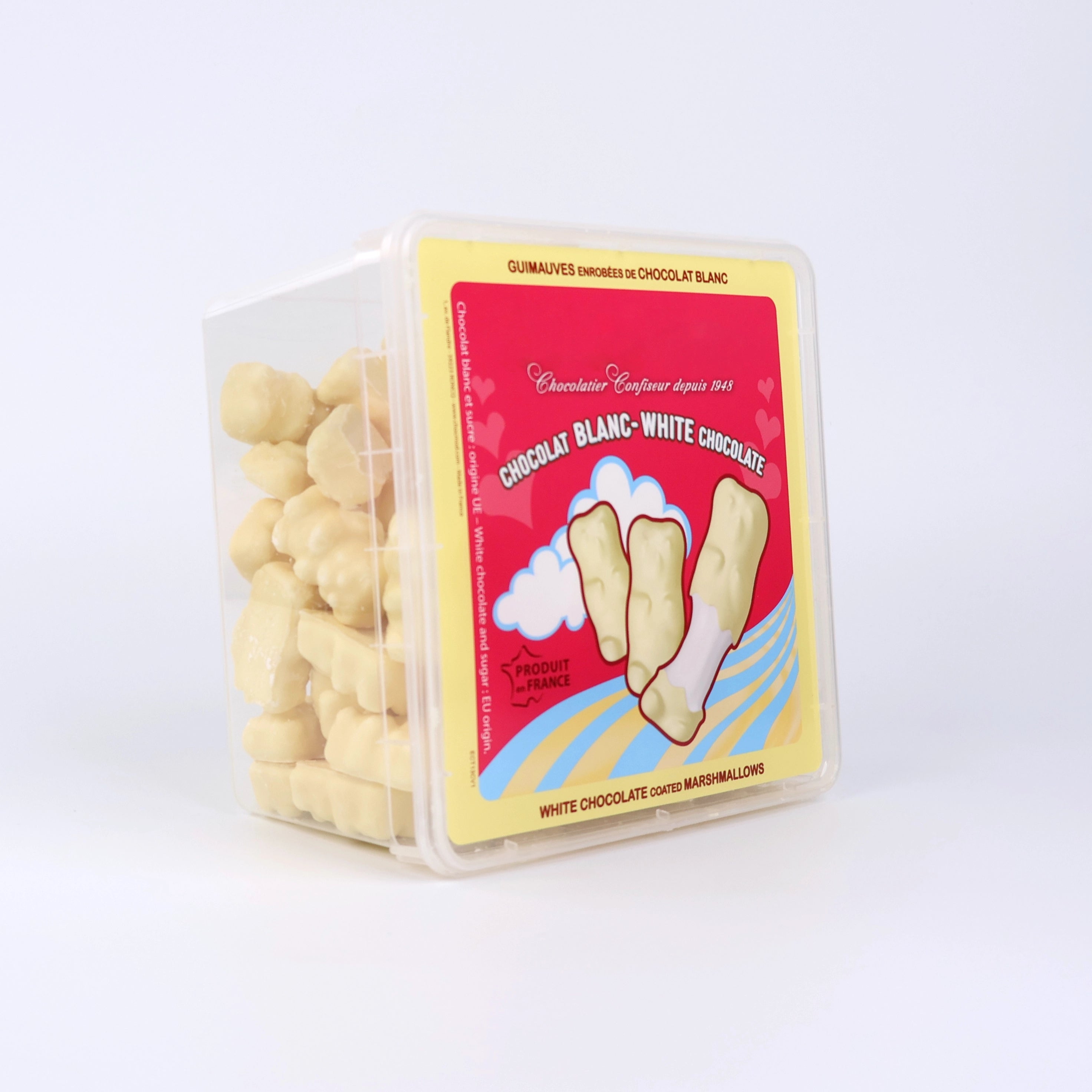 Boîte transparente remplie d'oursons en guimauve enrobés de chocolat blanc avec étiquette colorée illustrant trois oursons.
