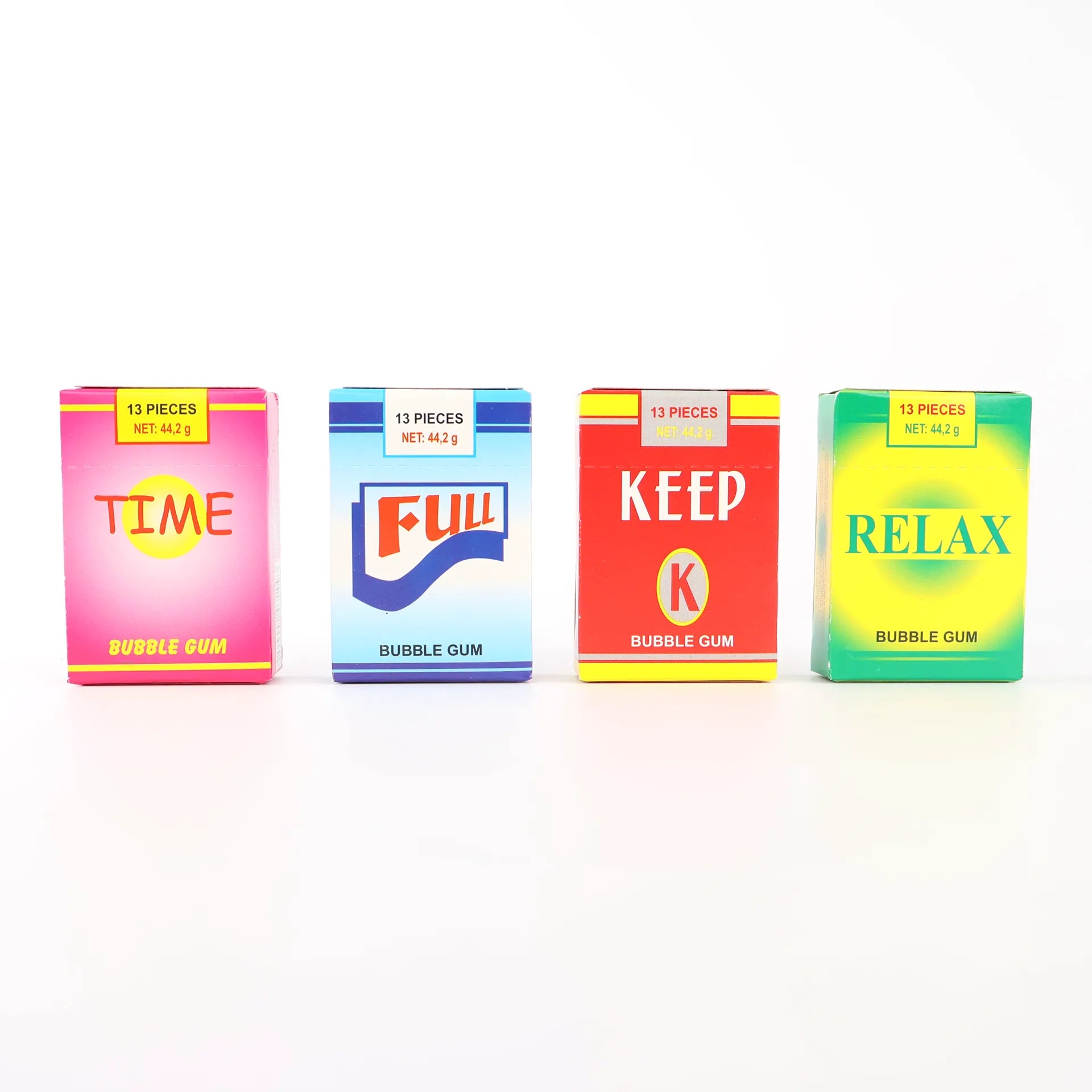 Présentation alignée des quatre variantes de paquets de chewing-gum : Time, Full, Keep et Relax.